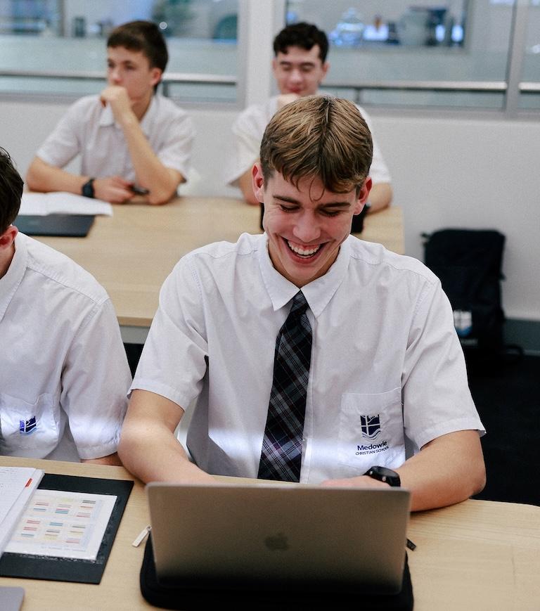 High school students at Medowie Christian School engaged in learning, enjoying a collaborative classroom environment.