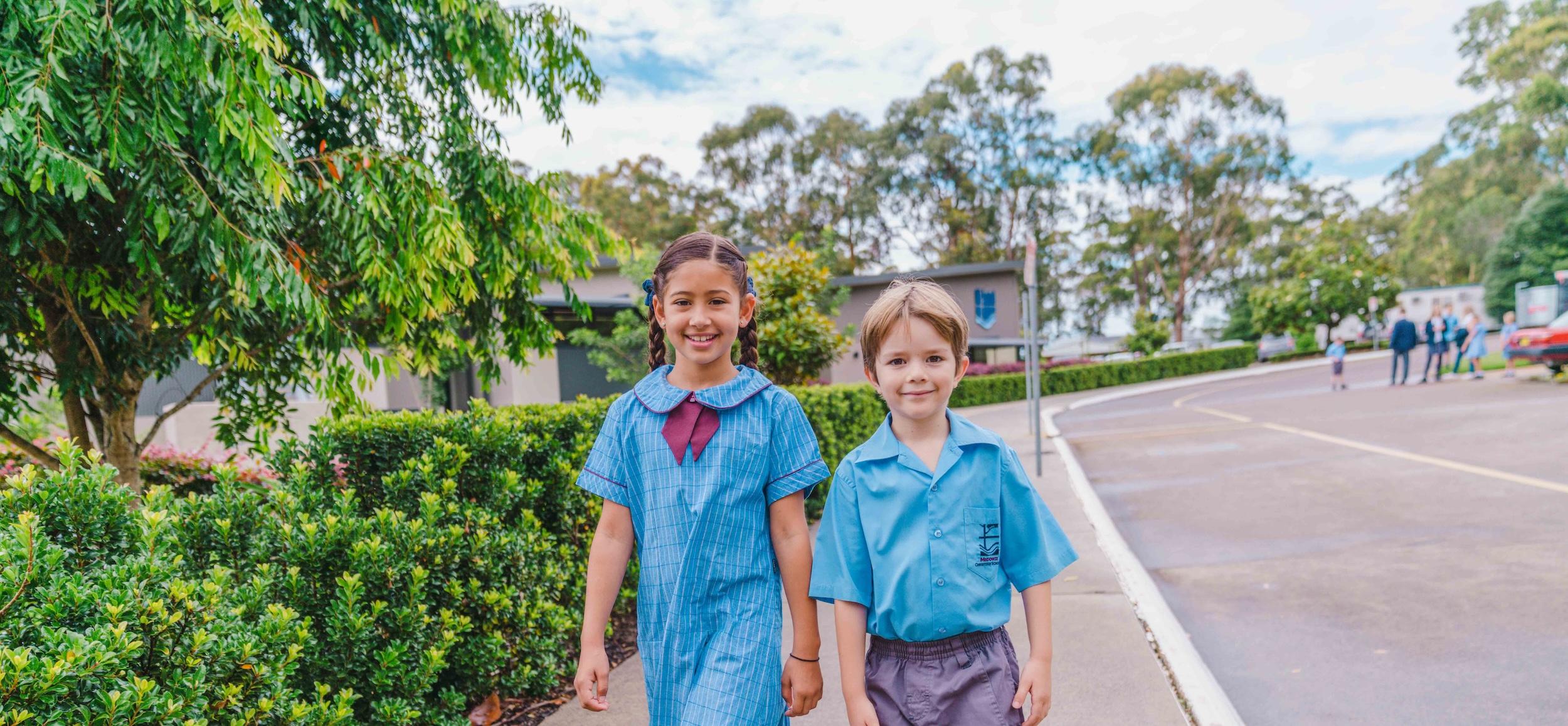 Students walking to the bus pickup area at Medowie Christian School, emphasizing accessibility and convenience for families.