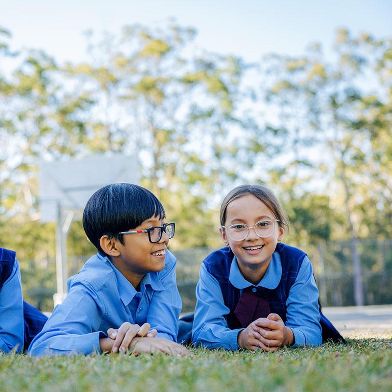 Medowie Christian School students enjoying time together outdoors, reflecting the school's welcoming community.